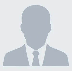 Professional silhouette of a lawyer in a suit, representing an attorney profile for legal directory.