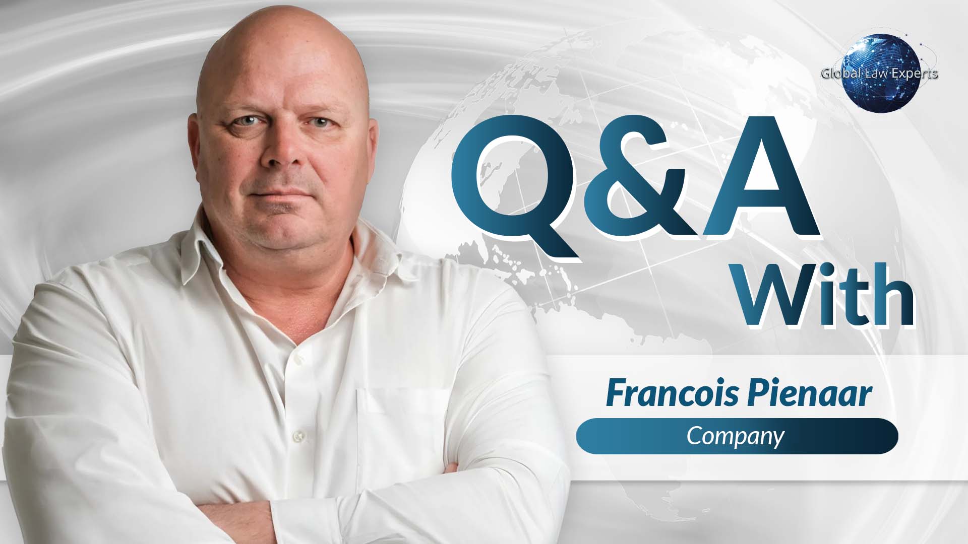 Legal expert participating in Q&A session, with a backdrop featuring a globe and text overlay.
