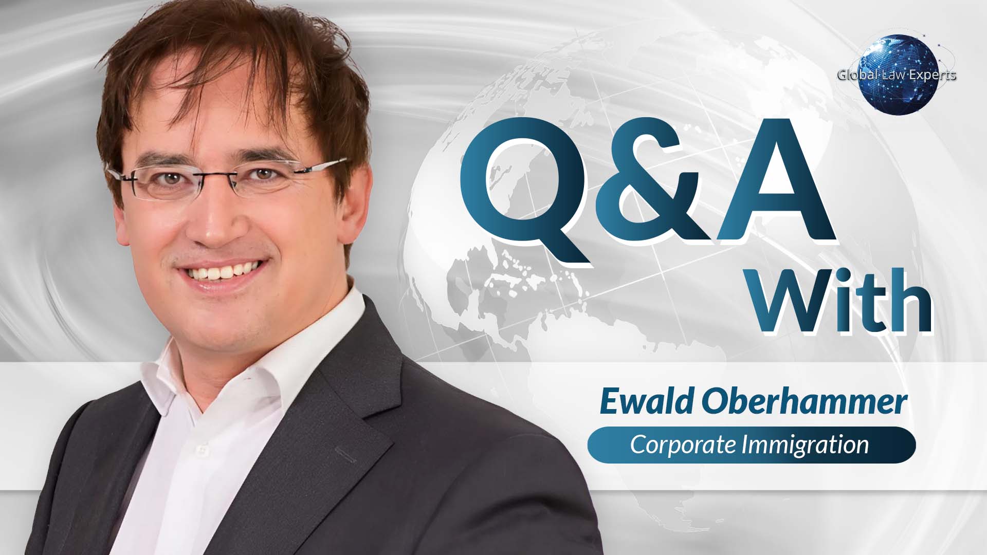 Corporate immigration attorney in professional attire, smiling against a global-themed background with Q&A text.