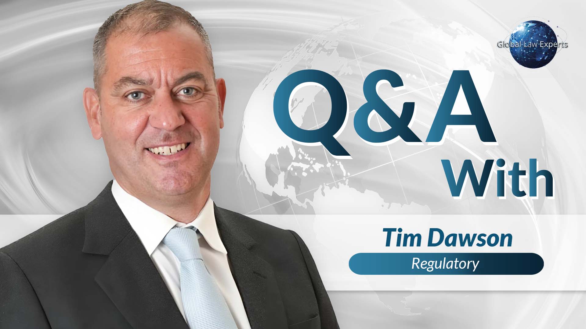 Regulatory attorney smiling in a suit, featured in a Q&A with an international context on a digital background.