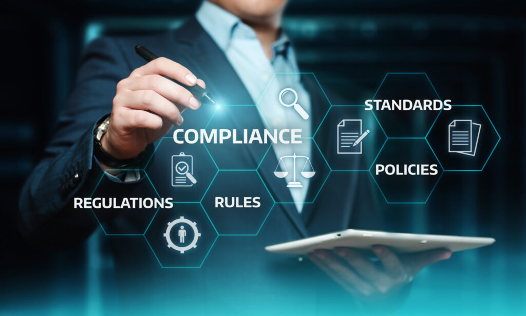 Business professional reviewing compliance standards with a tablet, surrounded by icons representing regulations and policies.