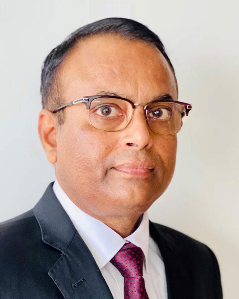 Lawyer in professional attire, looking confidently at the camera, suitable for legal directory profile.