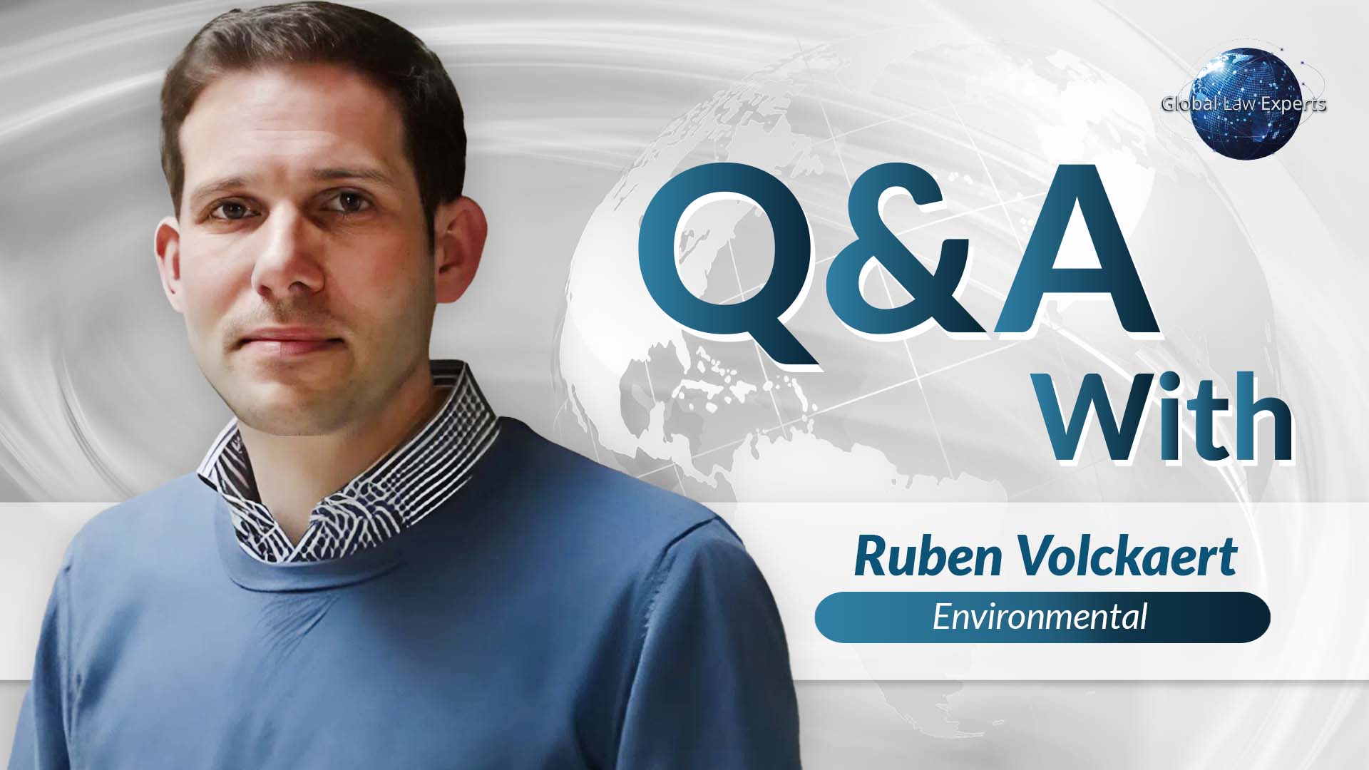 Professional in a blue sweater engaged in a Q&A session for environmental law expertise.