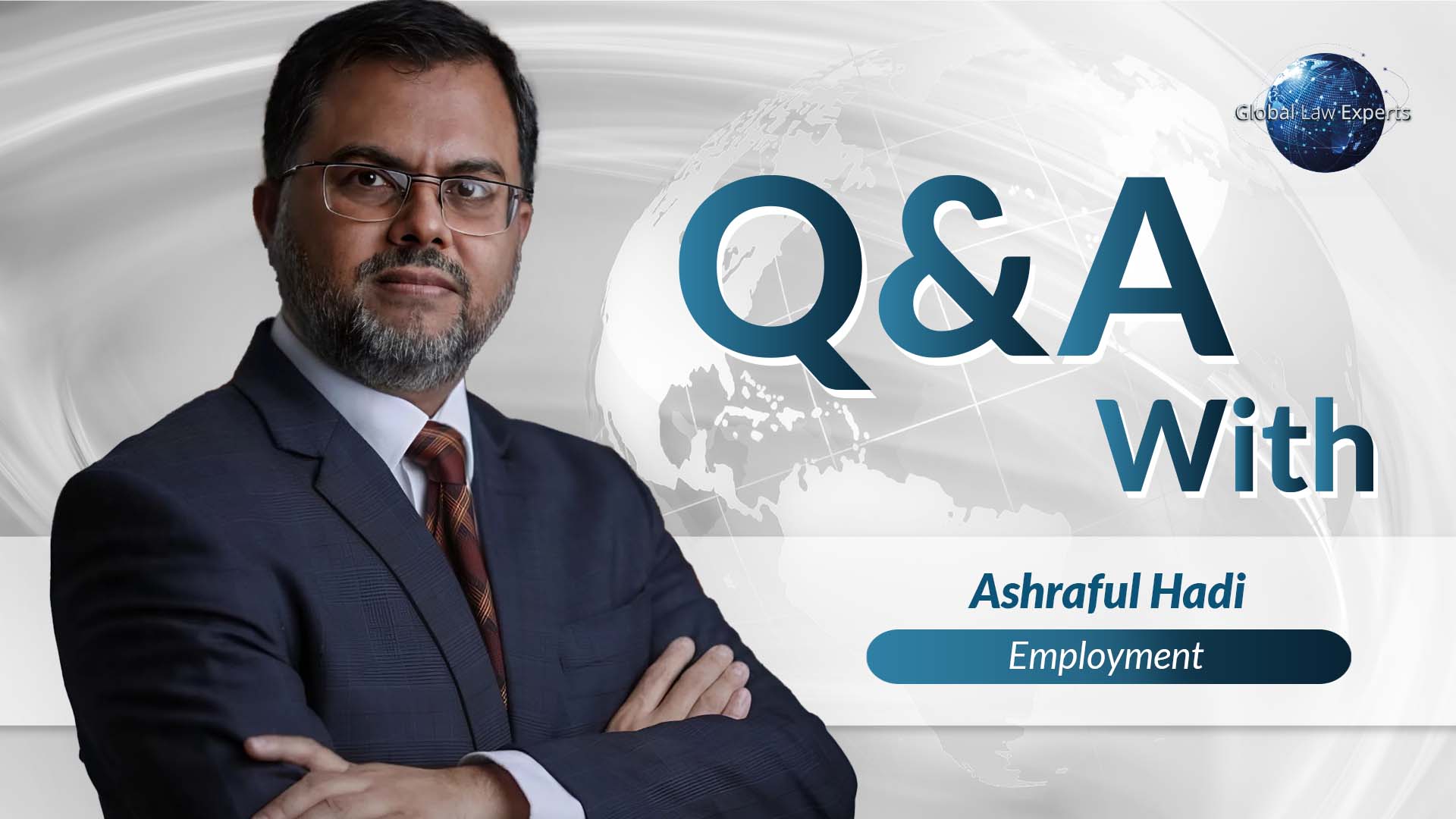 Lawyer posing confidently for an interview, with a backdrop featuring a global theme and "Q&A" text.