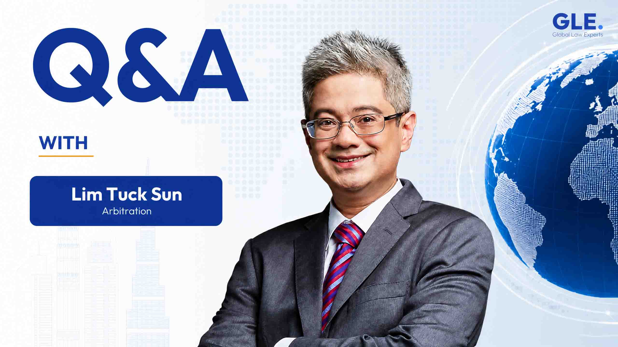 Lawyer specializing in arbitration, smiling with arms crossed, set against a backdrop featuring a globe and text.